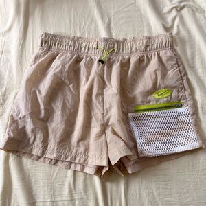 Nike Women's Beige Athletic Shorts with Mesh Pocket